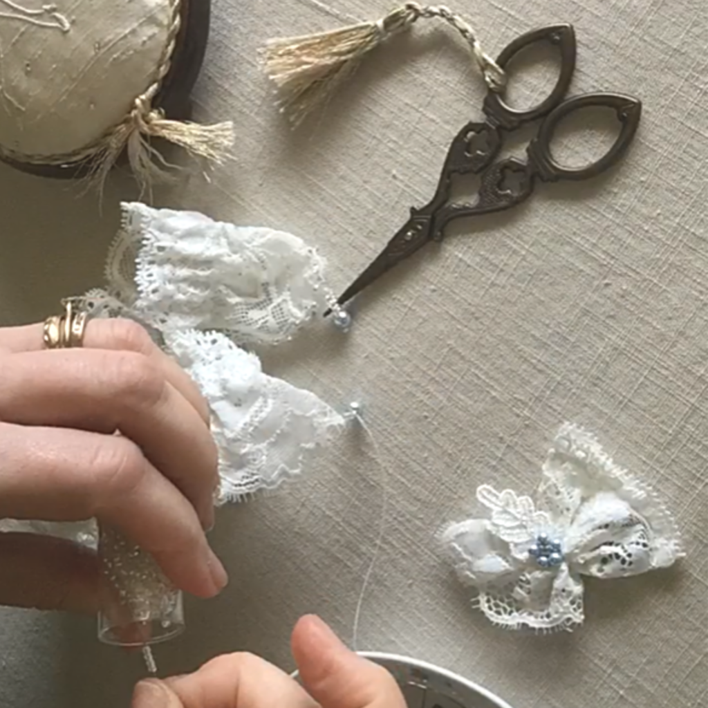 Handbeaded wedding garter my hands making