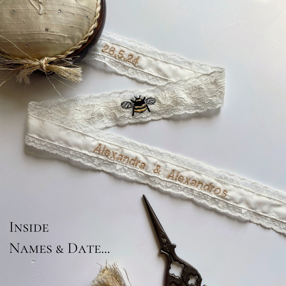 Embroidered text hidden inside the garter